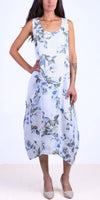 Sleeveless linen midi dress with blue floral print, scoop neck, and relaxed fit