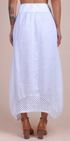 White linen skirt with crochet hem and high waist, shown from the back on model
