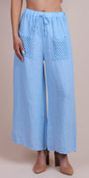 Light blue linen wide-leg pants with crochet front pockets and drawstring waist