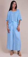 Woman modeling light blue crochet knit top and wide leg linen pants set