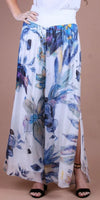 Women's flowy maxi skirt with blue and yellow floral print and side slit