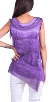 Woman wearing a sleeveless purple layered tunic top with asymmetrical hem and white pants