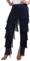 Woman wearing navy tiered ruffle pants with sheer layers and frayed edges