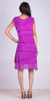 Woman wearing a sleeveless layered magenta dress and beige high heels, back view