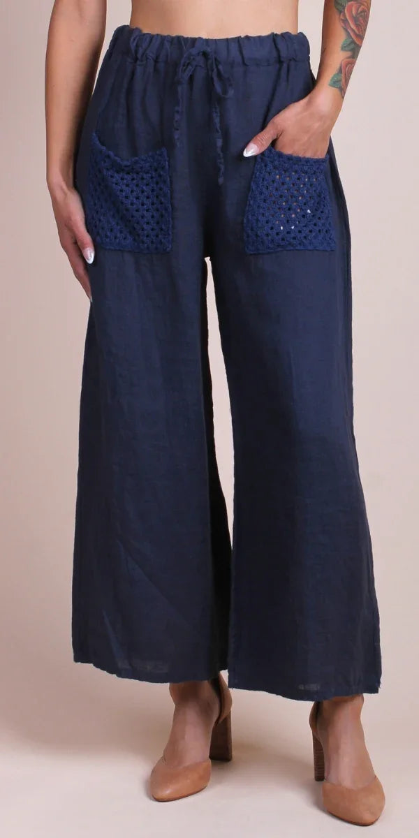Women's navy wide-leg linen pants with crochet front pockets and drawstring waist