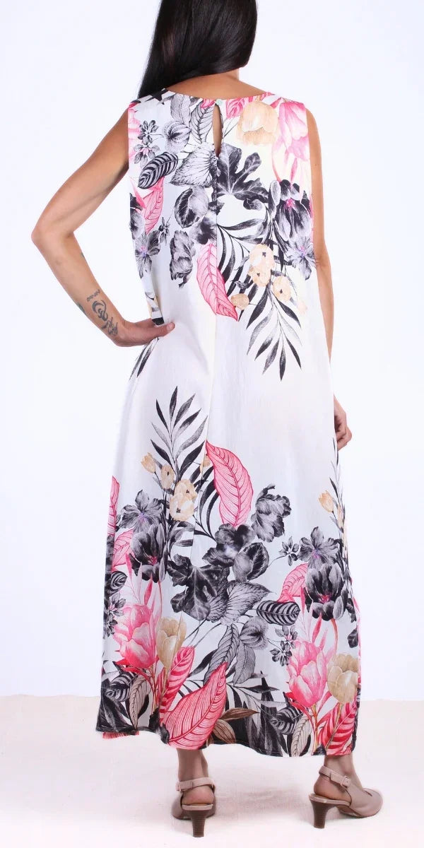 Sleeveless white maxi dress with bold pink, beige, and black floral print, shown from the back
